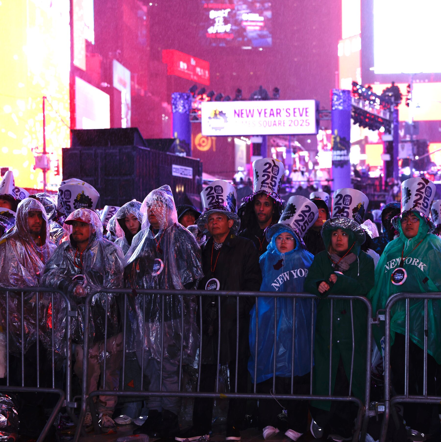 Times Square Revelers Ring in a Soggy New Year After Thunderstorm